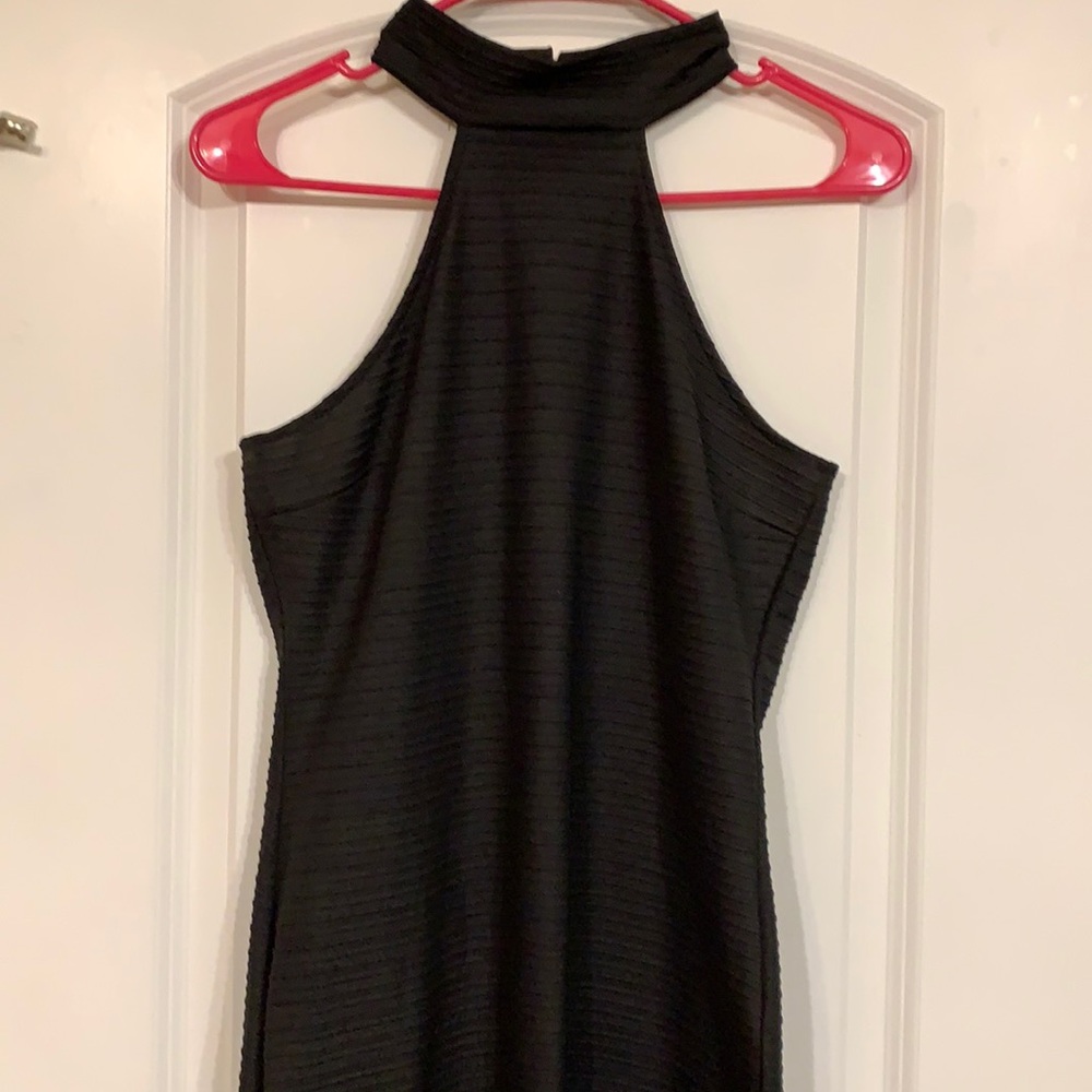 Black fitted sleeveless dress